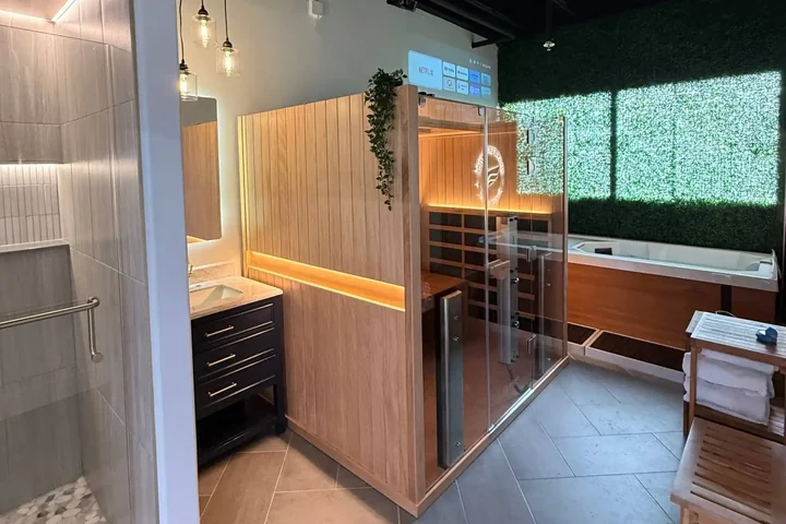 Inside the contrast therapy room at Revival Performance Physical Therapy, sauna and cold plunge side by side