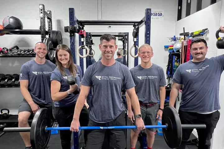 The Revival Performance Physical Therapy team on the gym floor in San Antonio