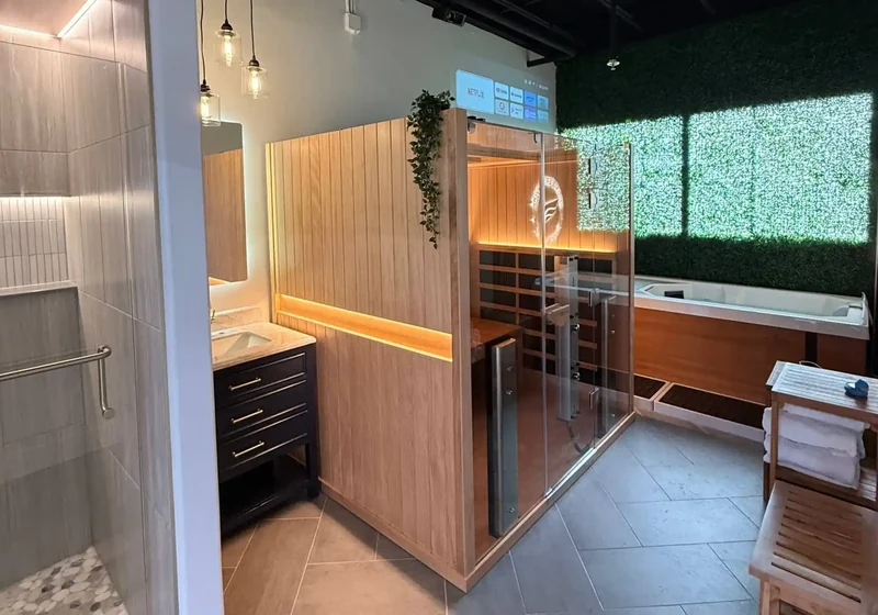 Contrast therapy room with an infrared sauna and a cold plunge side by side