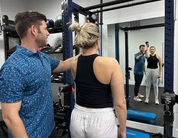 Doctor of Physical Therapy reviewing a treatment plan with a patient